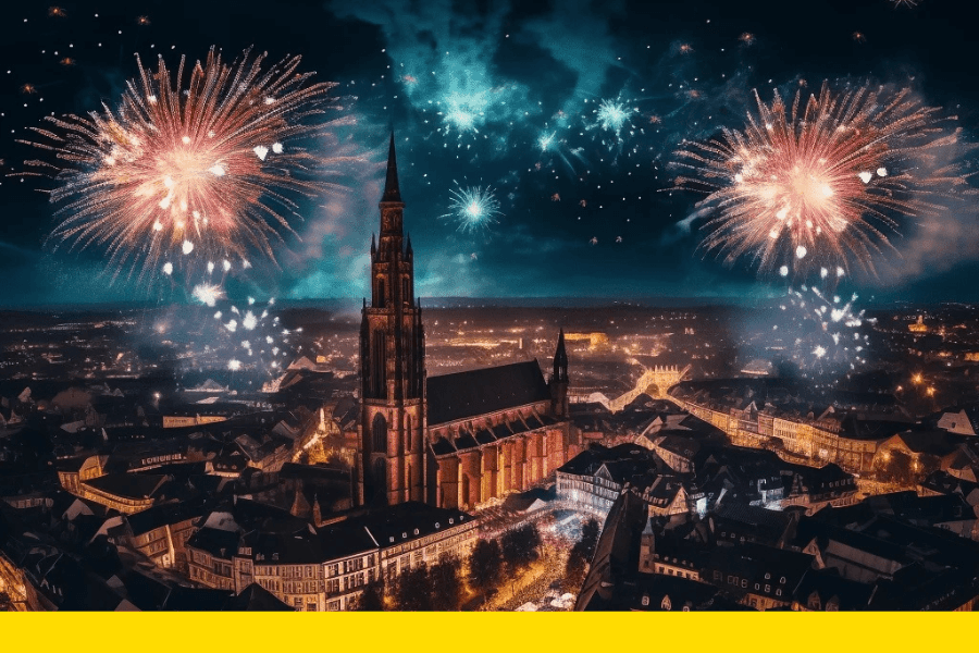 Retour sur 2023: Feu d’artifice illuminant la cathédrale de Strasbourg, symbole de célébration et de festivités dans la ville.